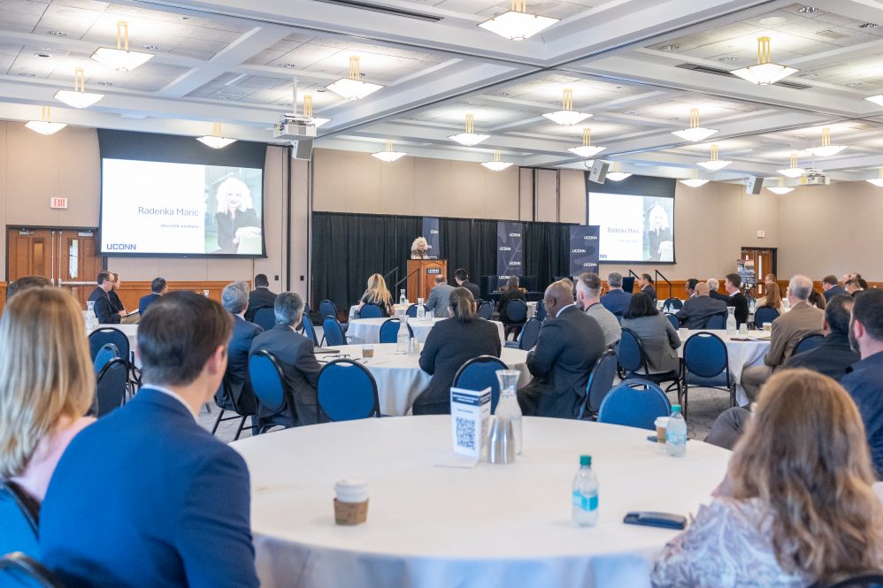 Attendees of the "UConn Forum: Economic Engine of a Thriving Connecticut" event listen to UConn President Radenka Maric speak in the Rowe Commons ballroom on Thursday, Oct. 31, 2024. (Sydney Herdle/UConn Photo)